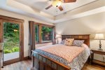 The master suite with a queen-size bed